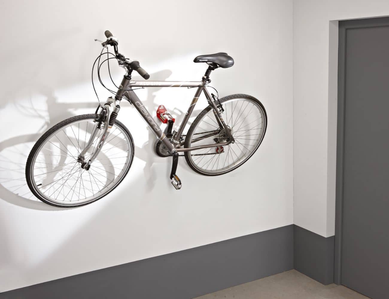 Crochet mural fixation pédale Mottez